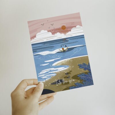 A vibrant A4 art print titled On the River - Paddleboarding is held in hand, beautifully depicting a paddleboarding scene on ocean waves. The artwork features a stunning sunset, birds soaring in the sky, and lush beach plants. Elegantly captioned Into the Sea, this print captures the essence of paddleboarding adventures at sea.