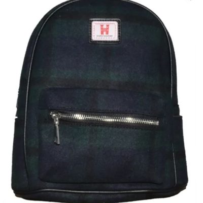 Discover the stylish Black Watch Tartan Plaid Backpack, featuring a timeless dark green and navy color scheme. This versatile backpack includes a convenient front zippered pocket for easy access to essentials. A distinctive rectangular patch with a red and white logo near the top enhances its classic appeal, making it an ideal choice for anyone seeking both functionality and iconic design in their backpacks.