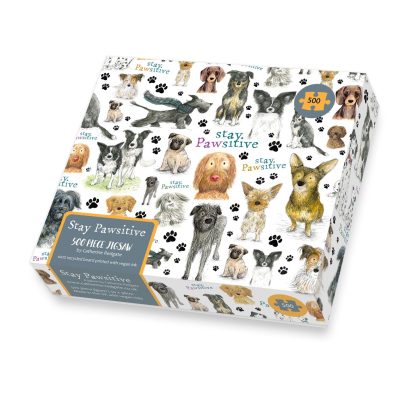 The Stay Pawsitive 500-Piece Dog Jigsaw Puzzle features delightful illustrations of various dog breeds and paw prints, along with the inspiring message Stay Pawsitive. This playful dog-themed puzzle is perfect for any pet lovers collection.
