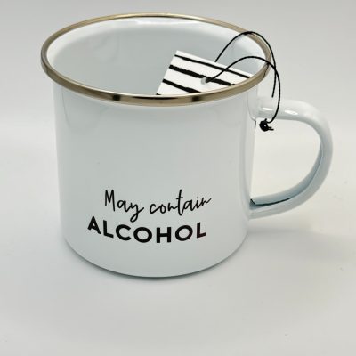 Discover our stylish white enamel mug featuring a chic silver rim and the playful phrase May Contain ALCOHOL in bold black lettering. Perfect for those who enjoy a touch of humor with their beverages, this mug is complemented by a trendy black and white striped tag attached to the handle. Grab the attention of your friends or guests with this standout piece, pictured against a clean, plain white background. Optimize your kitchen decor or gift it to a friend; its ideal for any occasion where fun meets function!.