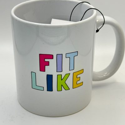 Boost your coffee experience with our white ceramic mug featuring the colorful FIT LIKE design. Perfect for tea lovers, this stylish mug showcases a tea bag string gently draped over the edge. Ideal for minimalist aesthetics, its plain white background enhances any kitchen decor.