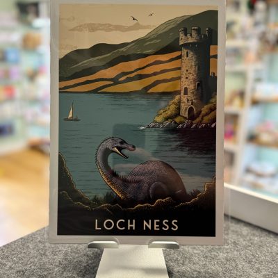 Discover a captivating Loch Ness postcard featuring an illustration of the legendary Loch Ness Monster swimming in the water. This picturesque scene includes a sailboat elegantly gliding on the crystal-clear lake, with a majestic castle tower adorning the scenic shoreline. Encircled by rolling hills and framed under a mystical cloudy sky, this postcard perfectly captures the enchanting allure of Scotlands iconic destination.